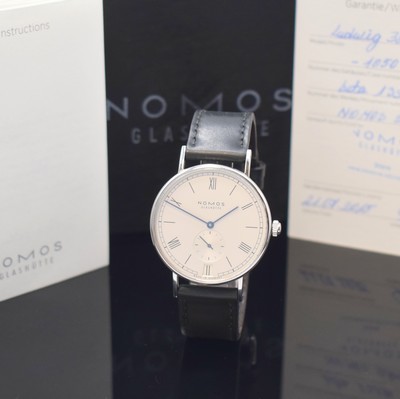 NOMOS Glashütte Herrenarmbanduhr Modell Ludwig, Deutschland verk. lt. beil. Pap. 07/2015, Automatik, Edelstahlgeh. m. orig. Lederband u.Dornschl., ...