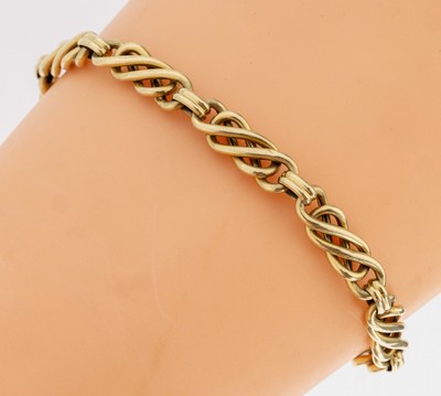 14 kt Gold Armband, GG 585/000, einzelne Glieder in Form einer liegenden Acht in sich verschlungen, L. ca. 19 cm, Federringschließe,ca. 5.3 g