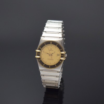 OMEGA Constellation Damenarmbanduhr in Stahl/ Gold am Stahlband, Schweiz um 1990, Quarz, 2-tlg. Geh., Boden aufgedr., integr. Band m. Faltschl., ...