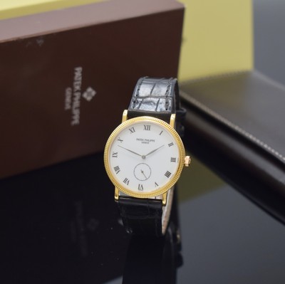 PATEK PHILIPPE Calatrava Armbanduhr in GG 750/000 Referenz 3919, Handaufzug, Schweiz um 1990, 2-tlg. Geh. inkl. Lederband m. orig. Dornschl. in GG ...
