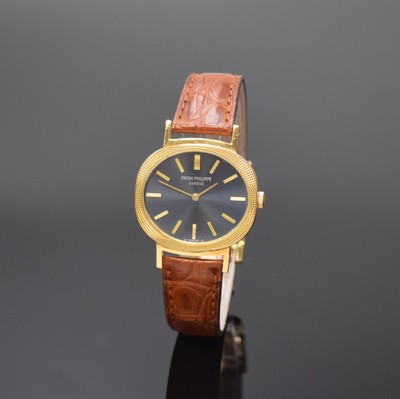 PATEK PHILIPPE Armbanduhr in GG 750/000 Referenz 3581-1, Handaufzug, Schweiz 1970er Jahre, 3-teil. Geh. nachtr. m. Bandanstößen und Lederband ...