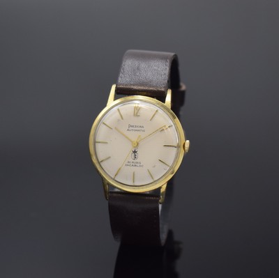 PREZIOSA Armbanduhr in GG 585/000, Schweiz um 1965, Automatik, Boden aufgedr., silb. Zifferbl. teilw. fl., gold. Std.-Ind., gold. Zeiger, Kal. Felsa ...