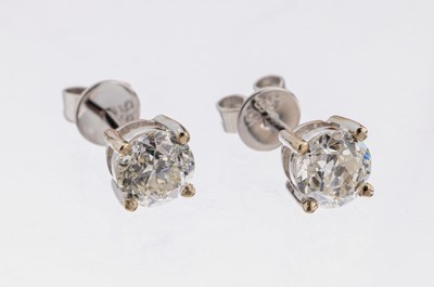 Paar 14 kt Gold Diamant-Ohrstecker, WG 585/000, 2 Altschliffdiamanten zus. ca. 1.09 ct Weiß-l.get.Weiß/si-p