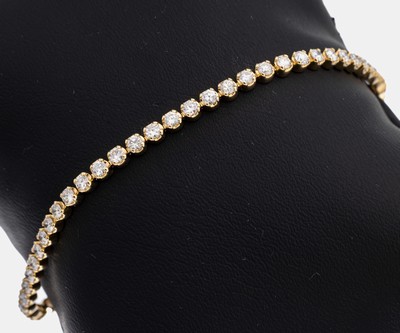 14 kt Gold Brillant-Armband, GG 585/000, 58 Brillanten zus. ca. 2.89 ct feines Weiß- Weiß/vs-si, (1 x p), Krappenfassungen, L. ca. 18.5 cm, ca. ...