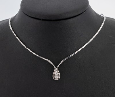 14 kt Gold Diamant-Collier, WG 585/000, 4 Diamanten zus. ca. 0.04 ct Weiß/si, ca. 9.5 g, L. ca. 43.5 cm, Kastenschloss mit Sicherheitsacht