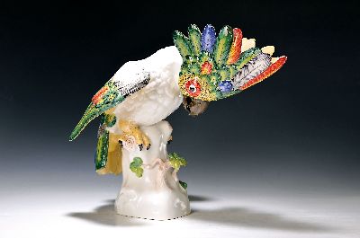 Porzellanfigur, Kakadu, Nymphenburg, um 1900, bunt bemalt, min. an einem Blatt best., große Ausformung, H. ca. 32 x 34 cm