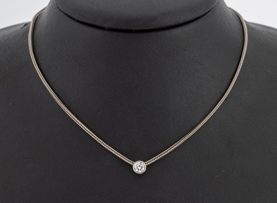 14 kt Gold Brillant-Anhänger, WG 585/000 gepr., Brillant ca. 0.30 ct Weiß/si, an Kette, WG 585/000 gepr., L. ca. 52 cm, Kastenschloss mit ...