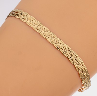 18 kt Gold Armband, GG 750/000, mehrreihig geflochten, L. ca. 20 cm, ca. 5.5 g, Karabinerschließe