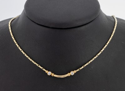 14 kt Gold Brillant-Collier, GG 585/000, längliches Mittelteil, 2 Brillanten zus. ca. 0.18 ct Weiß/si, L. ca. 43 cm, Karabinerschließe, ca. 12.4 g