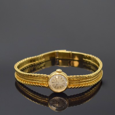 OMEGA Damenarmbanduhr in GG 750/000 Referenz 7088 GY, Handaufzug, Schweiz um 1961, 2- teil. Geh., Boden aufgedr., orig. Band zum Ende verlängert, ...