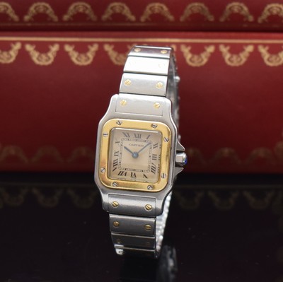 CARTIER Santos Damenarmbanduhr in Stahl/Gold Referenz 1057930, Schweiz um 2000, quarz, leicht gebogenes Geh., Boden 8-fach verschr., orig. ...