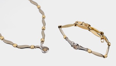 14 kt Gold Brillant-Schmuckset, WG/GG 585/000, part. sat., best. aus: Collier, L. ca. 41 cm, und 1 Armband, L. ca. 19.5 cm, jeweils mit 1 Brillant ...