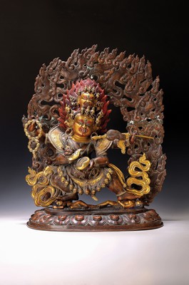 Großer Dharmapala, Nepal, wohl um 1900, Bronze, teilweise vergoldet, teilweise bemalt, Mahakala mit vier Köpfen, beide Füsse auf Menschen stehend, ...