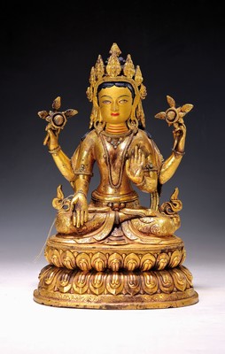 Sitzende Tara, Tibet, wohl 19./20. Jh., Bronze vergoldet, bemaltes Gesicht und Haare, fein verziertes Gewand, doppelter Lotussockel,mit ...