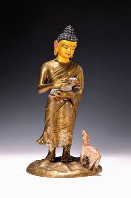 Buddha mit zwei Lämmern, Nepal, 20. Jh., Bronze, Lämmer und Gesicht und Haare bemalt, Reparaturstelle, H. ca. 30 cm