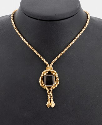 18 kt Gold Rauchquarz-Collier, GG 750/000, aufwändig aus kl. Goldplättchen, geschwungenesMittelteil mit facett. Rauchquarz, L. ca. 47 cm, ...