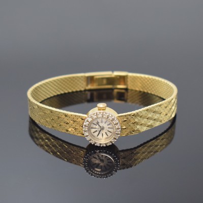 PREDICT Damenarmbanduhr in GG 585/000 mit Diamanten, Schweiz um 1965, Handaufzug, Goldband, Boden aufgedr., Lünette aufw. m. Diamanten bes., silb. ...