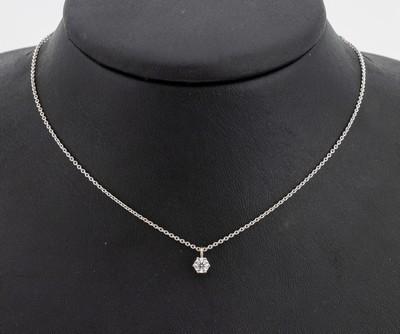 14 kt Gold Brillant-Anhänger, WG 585/000, Brillant ca. 0.25 ct Weiß/si, an Kette, L. ca.44 cm, ca. 2.5 g