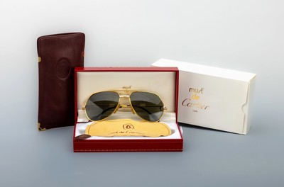 CARTIER Sonnenbrille, Modell Santos, Metallverg., Rahmengröße 135, sign., orig. Etui, Umkarton und Ledermäppchen