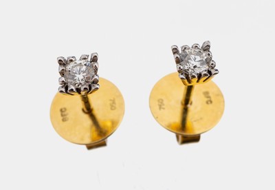Paar 18 kt Gold Brillant-Ohrstecker, GG 750/000, 2 Brillanten zus. ca. 0.20 ct Weiß/si, ca. 1.9 g