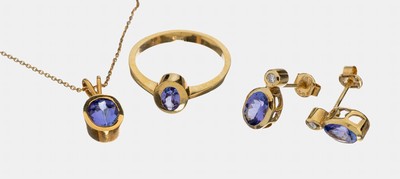 18 kt Gold Tansanit-Schmuckset, GG 750/000,best. aus: 1 Ring, RW 56, ovalfacett. Tansanitca. 0.25 ct, 1 Anhänger, ovalfacett. Tansanit ca. 1.0 ct, ...