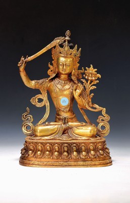 Bodhisattva der Weisheit - Manjushri, Nepal, 20.Jh., Kupferlegierung, vergoldet, mit Flammenschwert u. Buch, Prajnaparamita, H.ca.31 cm