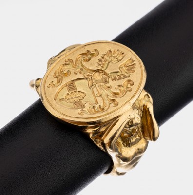 Massiver 18 kt Gold Wappenring, ca. 24.3 g, GG 750/000, Mittelteil mit feiner Wappengravur, Ringschiene in Form von 2 antiken Göttern, fein grav. ...