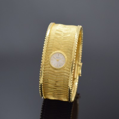 SARCAR ausgefallene Damenarmbanduhr in GG 750/000 mit sogenanntem Backwinder, Schweiz um 1965, Handaufzug, Geh. in Goldband integriert, Aufzug u. ...