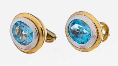 Paar 18 kt Gold Blautopas-Ohrstecker, GG/WG 750/000, in WG gefasste ovalfacett. Blautopase (beh.) zus. ca. 5.0 ct, ca. 14.5 g,mit zusätzl. ...