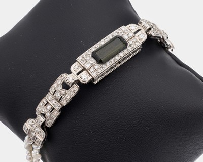 Platin Diamant-Armband, Platin gepr., ehem.Damenschmuckuhr aus den 1920er Jahren, aufwändig graviert, mittig 1 Turmalin-Rechteckca. 2.20 ct, 108 ...