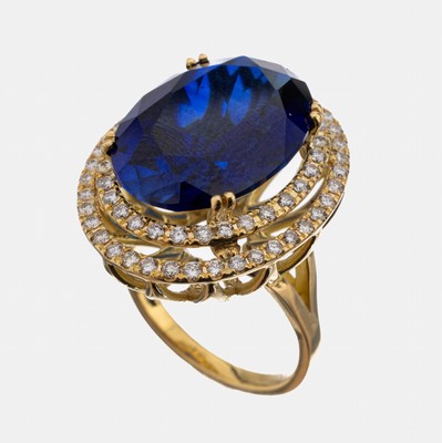 18 kt Gold Saphir-Brillant-Ring, GG 750/000, ovalfacett. Saphir (beh.) ca. 20.50 ct, 69 Brillanten zus. ca. 1.30 ct Weiß/vs, ca. 16.9 g, RW 55