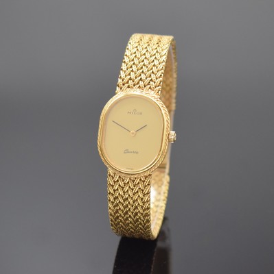 MILUS Damenarmbanduhr in GG 750/000, Schweiz um 1975, quarz, Boden aufgedr., orig. Gold- Flechtband, gold. Zifferbl. m. schwarzen Zeigern, M. 27 x ...