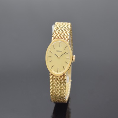 TISSOT Damenarmbanduhr in GG 585/000, Handaufzug, Schweiz 1970er Jahre, Milanaiseband, Boden aufgedr., gold. Zifferbl. m. aufgel. Indizes altersbed. ...