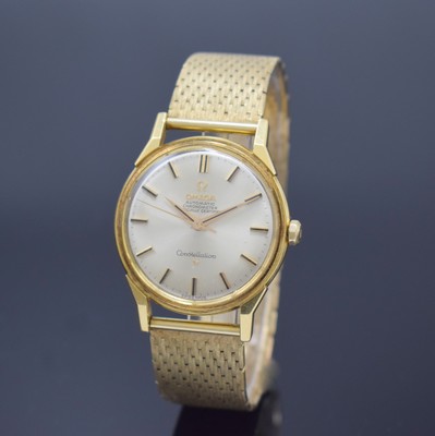 OMEGA Herrenarmbanduhr Constellation Chronometer in GG 750/000 Referenz 167.005/6 an neutralem GG 585/000 Milanaiseband, Schweiz um 1965, Automatik, ...