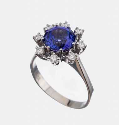 14 kt Gold Tansanit-Brillant-Ring, WG 585/000, mittig rundfacett. Tansanit ca. 2.10 ct, umgeben von 8 Brillanten zus. ca. 0.32 ct Weiß/si, RW 59, ...