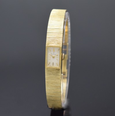 EXQUISIT rechteckige Damenarmbanduhr in GG 585/000, Schweiz um 1970, Handaufzug, 2-tlg. Geh., Boden aufgedr., integr. vorderseitig strukt. ...