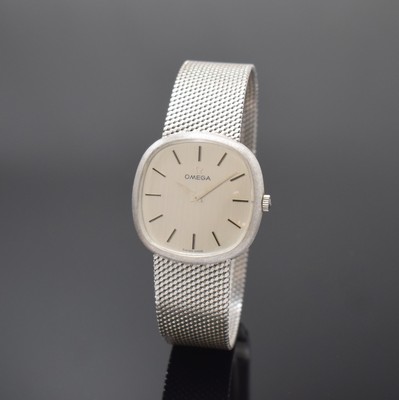OMEGA Armbanduhr in WG 585/000, Schweiz um 1971, Handaufzug, Milanaiseband, Boden aufgedr., vers. Zifferbl. m. aufgel. Indizes, Anz. v. Std. und ...