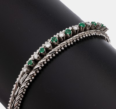 14 kt Gold Brillant-Smaragd-Armband, 1970er Jahre, WG 585/000, 8 Brillanten zus. ca. 0.28 ct Weiß/si, 7 rundfacett. Smaragde zus. ca. 0.30 ct, L. ...