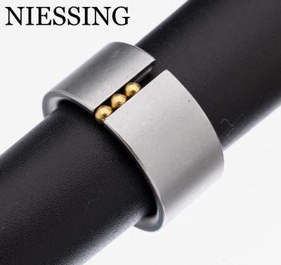 NIESSING Ring, Stahl, Spannring mit 3 GG Kugel, bez. EXPO 2000, RW 58, sign.