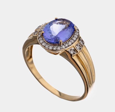 14 kt Gold Tansanit-Brillant-Ring, GG 585/000, mittig ovalfacett. Tansanit ca. 1.50 ct, umgeben von 34 Brillanten zus. ca. 0.30 ctWeiß/si, RW 63, ...