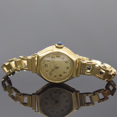 ANKRA Damenarmbanduhr in GG 585/000 am original Goldband, Deutschland um 1925, Handaufzug, tonneauförm. Scharniergeh. seitl. grav., abnehmbares ...