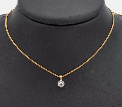 14 kt Gold Brillant-Anhänger, WG/GG 585/000, 1 in WG gefasster Brillant ca. 0.15 ct get.Weiß/vs, an Kette, GG 585/000, L. ca. 42.5 cm, ...