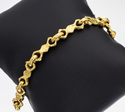 18 kt Gold Armband, GG 750/000 gepr., geometrische Glieder, strukt., L. ca. 19 cm, Hakenschließe mit kl. Brillant, ca. 23.9 g