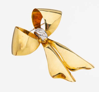 18 kt Gold Brillant-Brosche, GG/WG 750/000,Schleife, 3 in WG gefasste Brillanten zus. ca.0.10 ct Weiß/si, ca. 5.5 x 4.2 cm, ca. 9.5 g