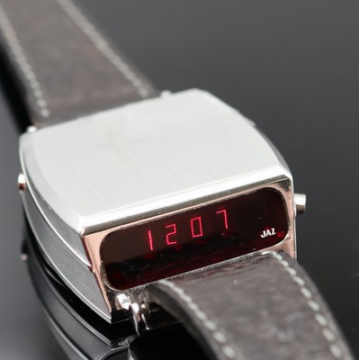 JAZ sehr seltene LED-Armbanduhr in Pultform, Schweiz um 1975, quartz, Aluminium-Geh. m. aufgedr. Stahlboden, seitl. Korrektur- u. Bedien-Drücker f. ...