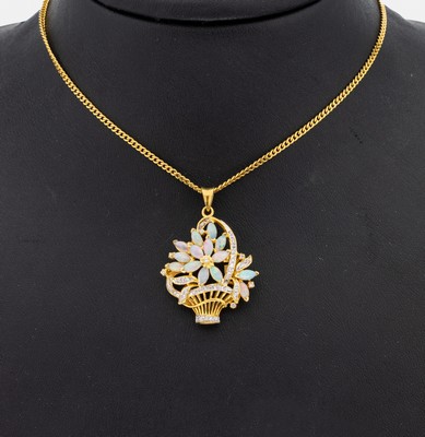 18 kt Gold Opal-Brillant-Anhänger, GG 750/000, Darstellung eines Blumenkorbs, 14 navettef. Opal-Cabochons zus. ca. 1.0 ct, 32 Brillanten zus. ca. ...