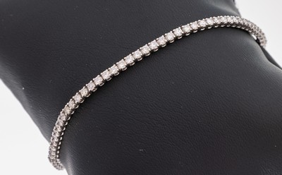 14 kt Gold Brillant-Armband, WG 585/000, 78Brillanten zus. ca. 2.63 ct Light Pink- Natural Fancy Pink/vs2-si3, laut AIG- Expertise, L. ca. 17.9 cm, ...