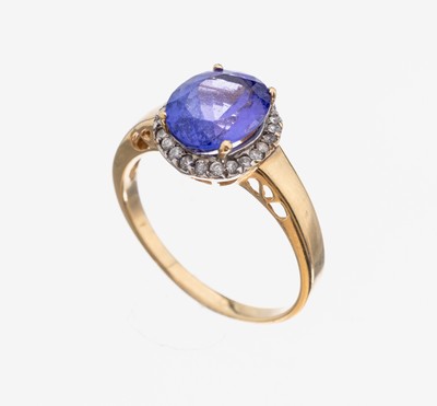 14 kt Gold Tansanit-Saphir-Ring, GG/WG 585/000, ovalfacett. Tansanit ca. 3.0 ct, umgeben von rundfacett. weißen Saphiren zus. ca. 0.35 ct, RW 60, ...