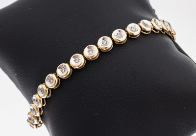 14 kt gold Brillant-Armband, GG/WG 585/000,33 Brillanten zus. ca. 1.0 ct Weiß/si, L ca. 20 cm, Kastenschloss mit 2 Sicherheitsachten, ca. 12.5 g