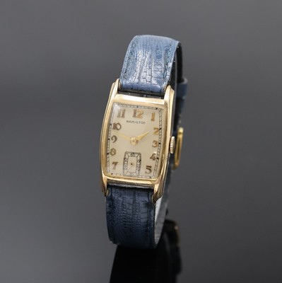 HAMILTON Herrenarmbanduhr, Handaufzug, USA um 1945, Tonnenform 10k Gold Filled Geh. in sich gew., Boden aufgedr., vers. Zifferbl. m. aufges. arab. ...